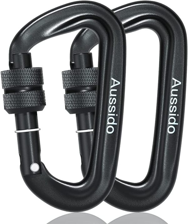 Small black carabiner designed for quick release on dog walking and when canicrossing